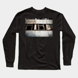 Broken windows of a derelict modern building in East Berlin. Long Sleeve T-Shirt